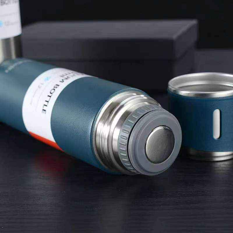 Termo de acero inoxidable + 3 tazas